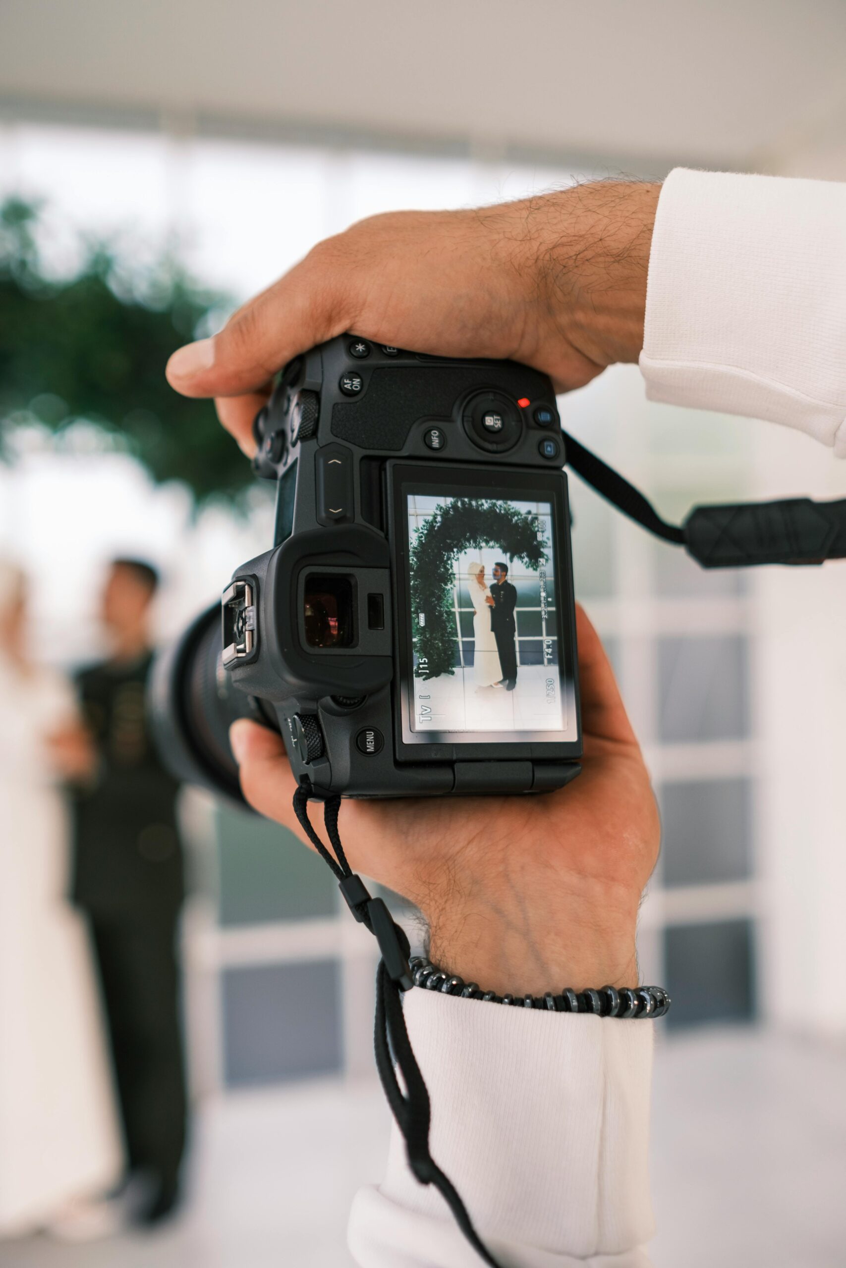 Closeup photo of a wedding photographer's viewfinder on their camera