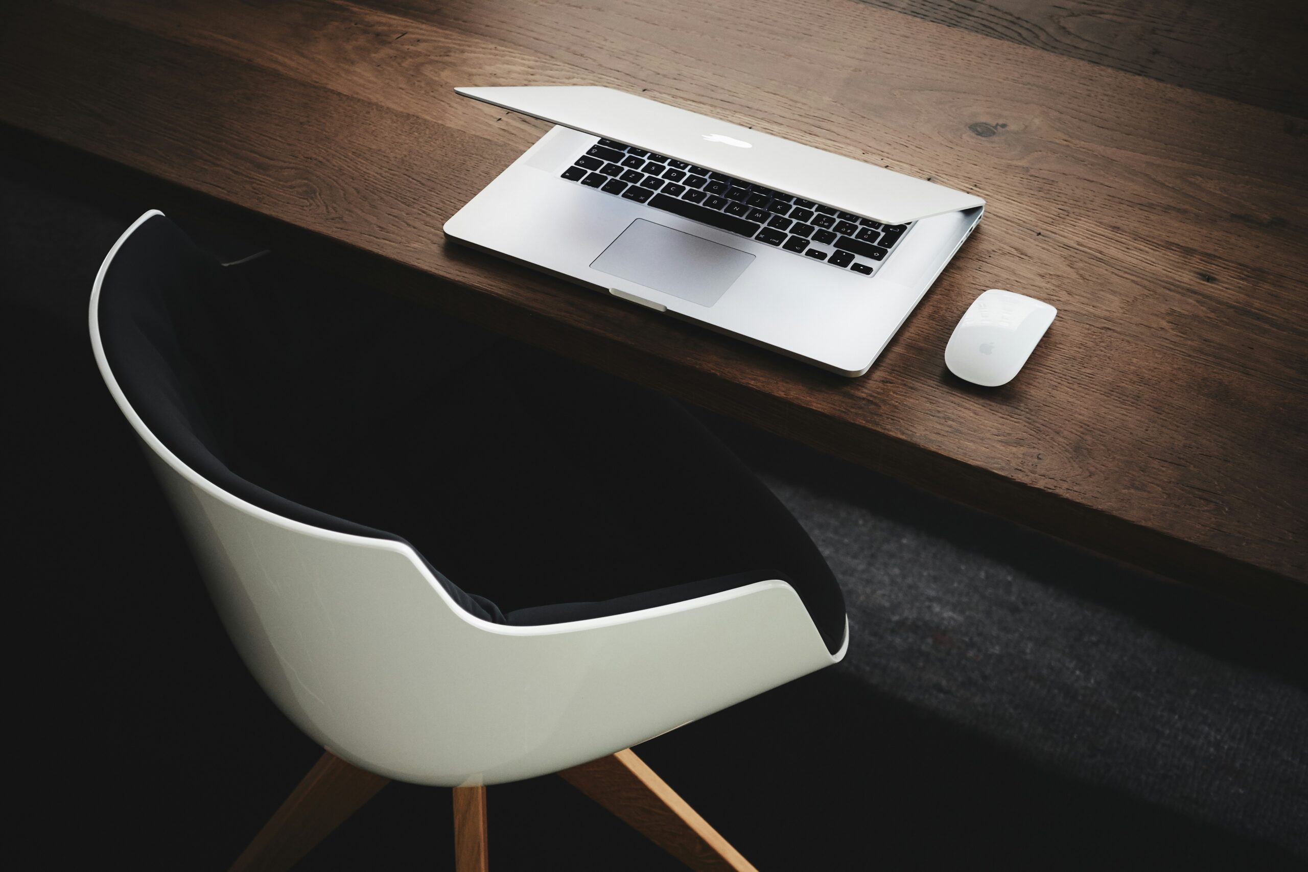 photo of laptop on table signaling a blank canvas for a website
